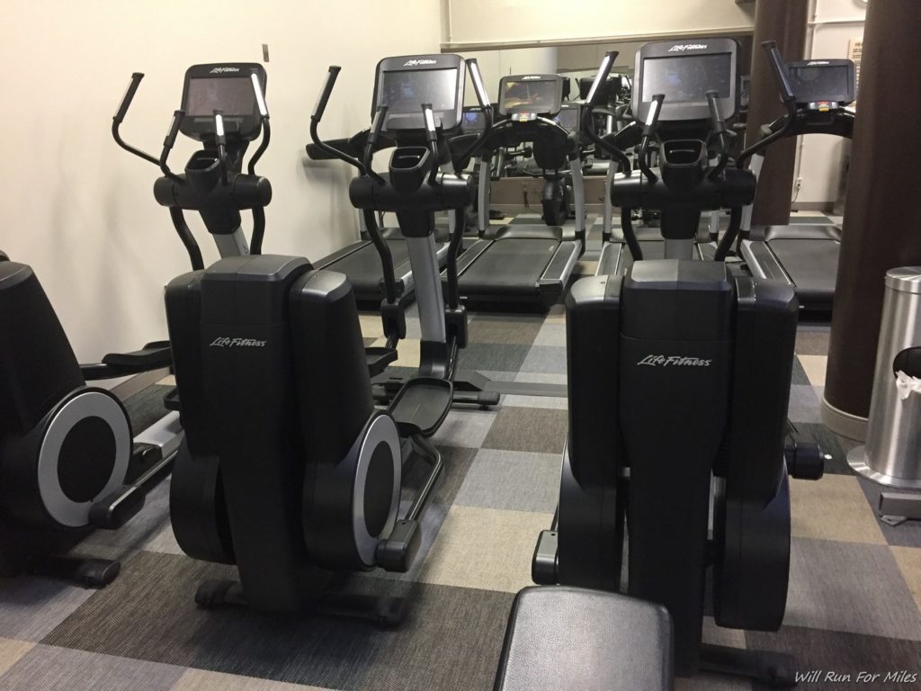 a group of exercise machines