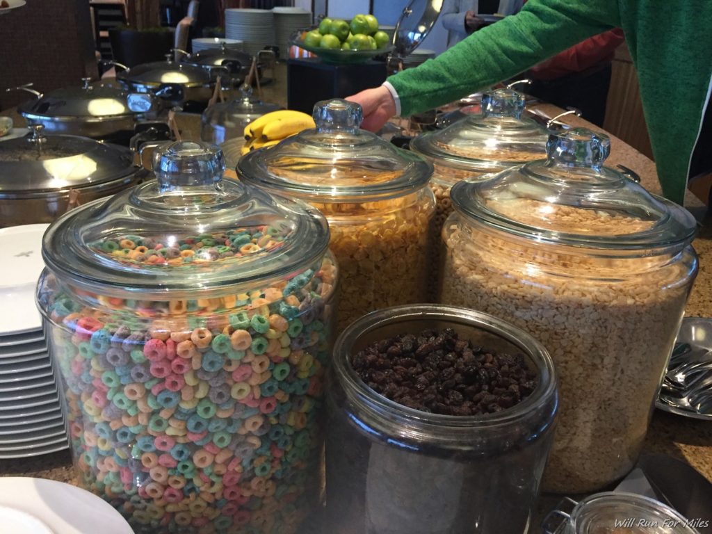 a group of glass containers with cereal