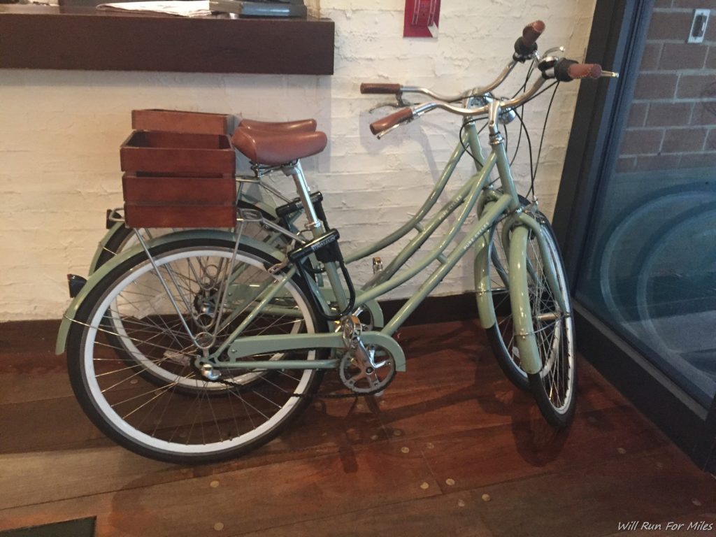 a bicycle with a basket on the front