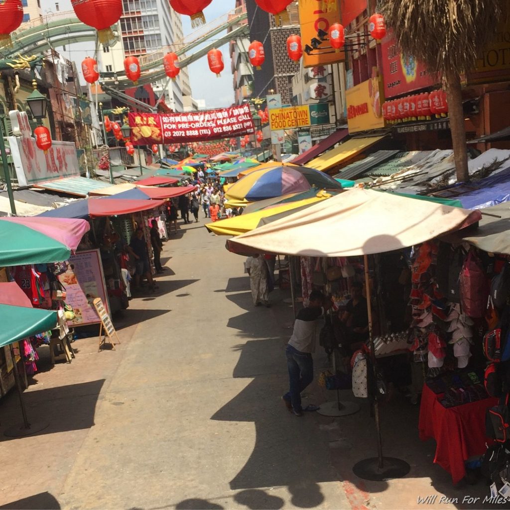 a street with tents and red lanterns