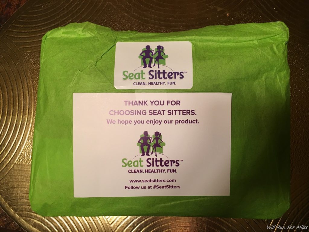 a green package with a white label