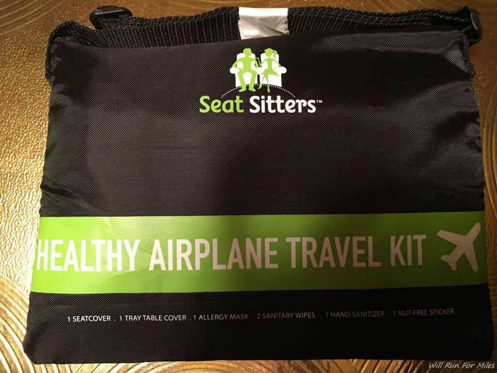 a black and green travel kit