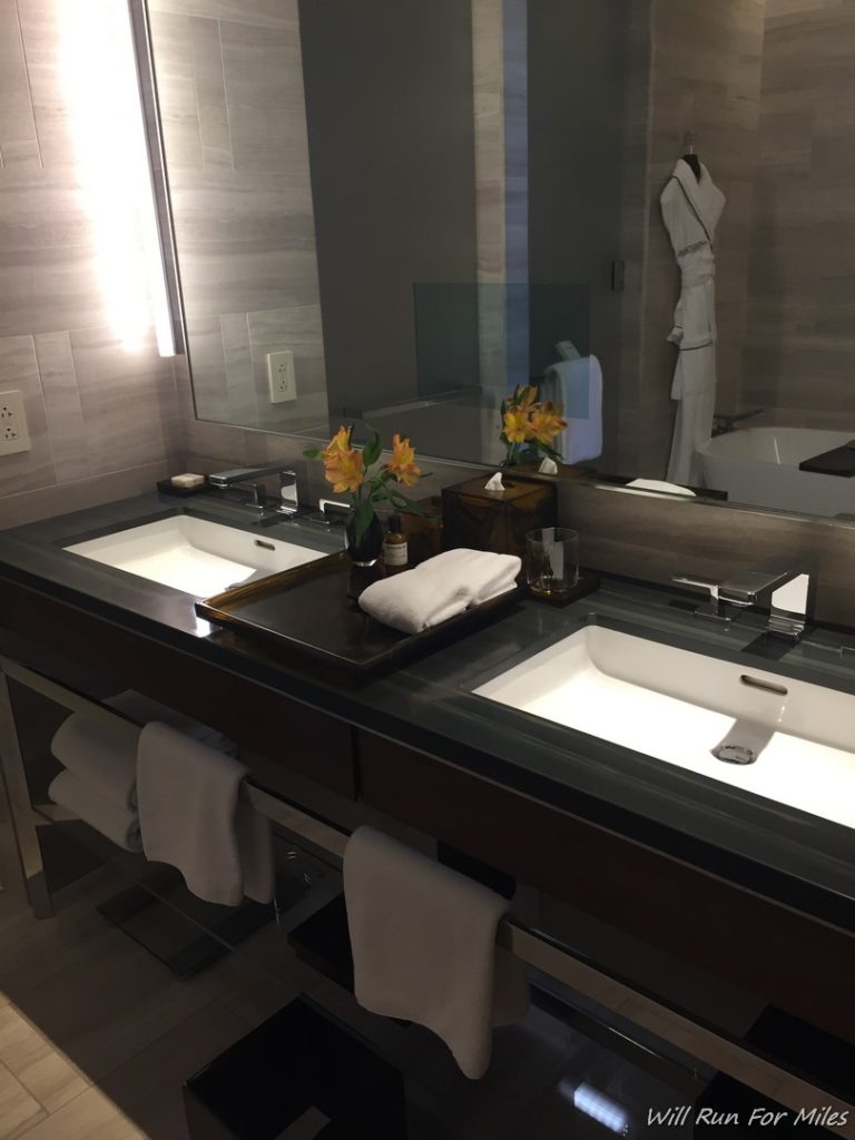 a bathroom with a mirror and sinks