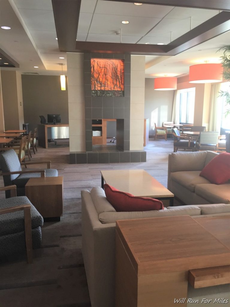 a room with couches and tables