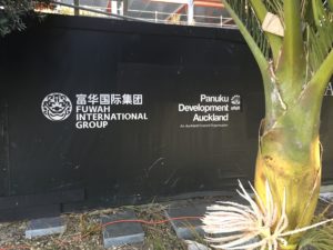 a black wall with white text on it