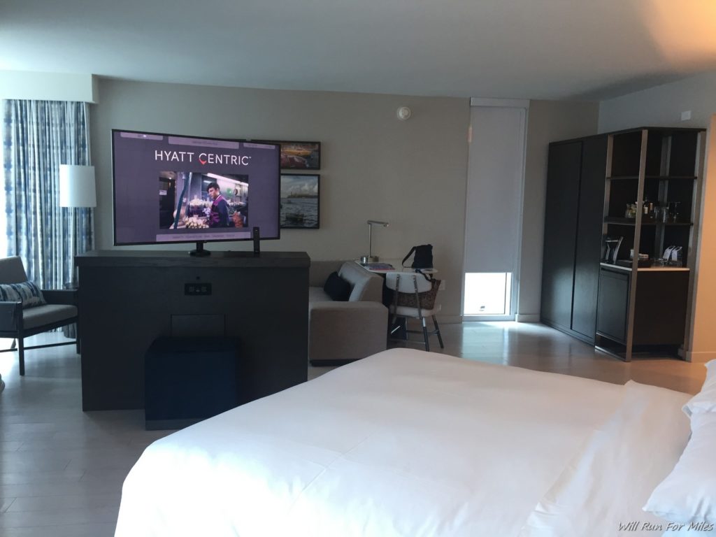 a room with a television and a tv on the wall