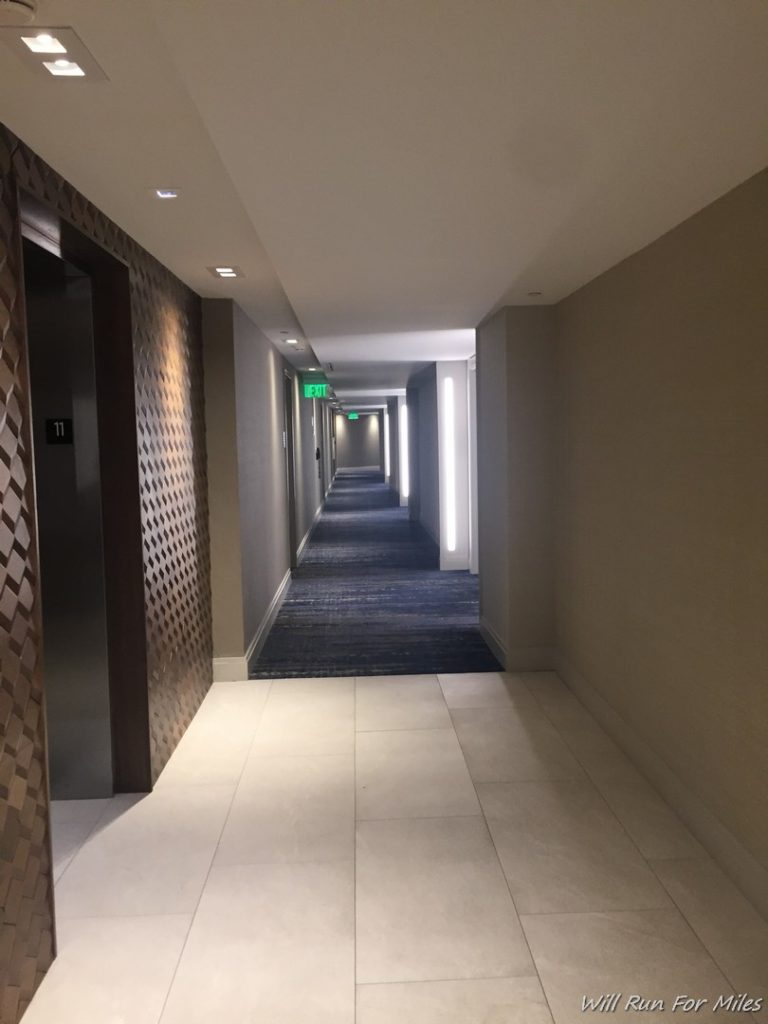 a hallway with a light on the ceiling