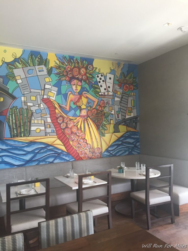 a painting on the wall of a restaurant