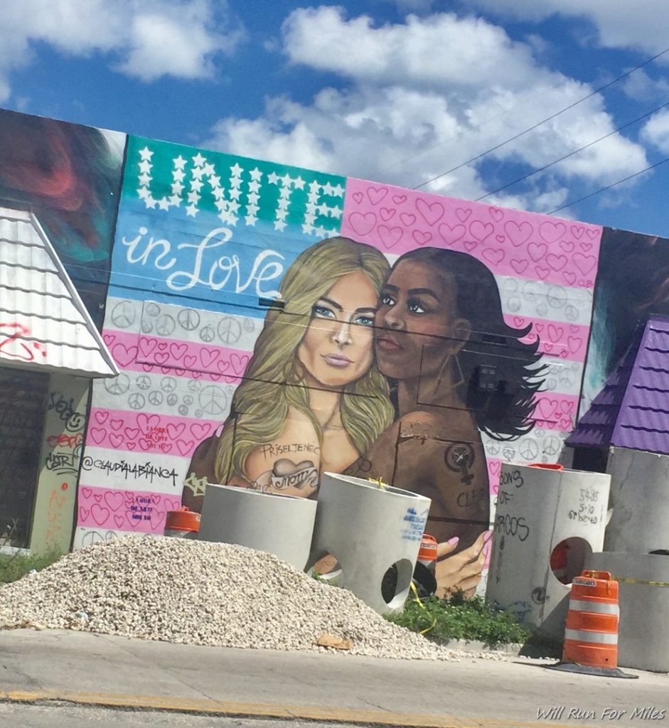 a mural of women on a wall