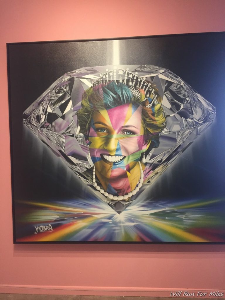 a painting of a woman in a diamond