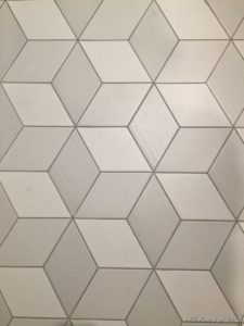 a white and grey tile