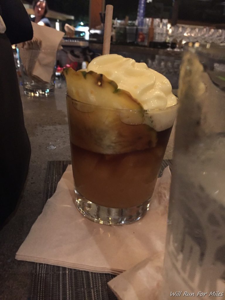 a drink with a pineapple on top