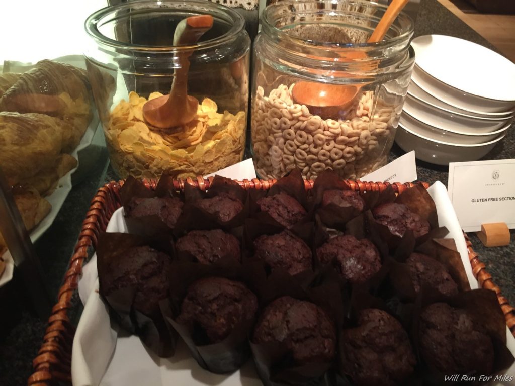 a basket of muffins and cereals