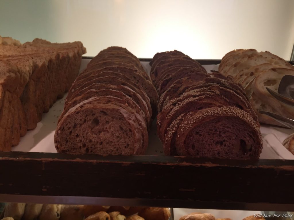 a tray of bread on a shelf