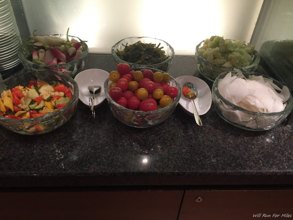 a group of bowls of vegetables and fruits