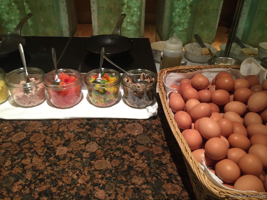 a basket of eggs and a pan on a counter