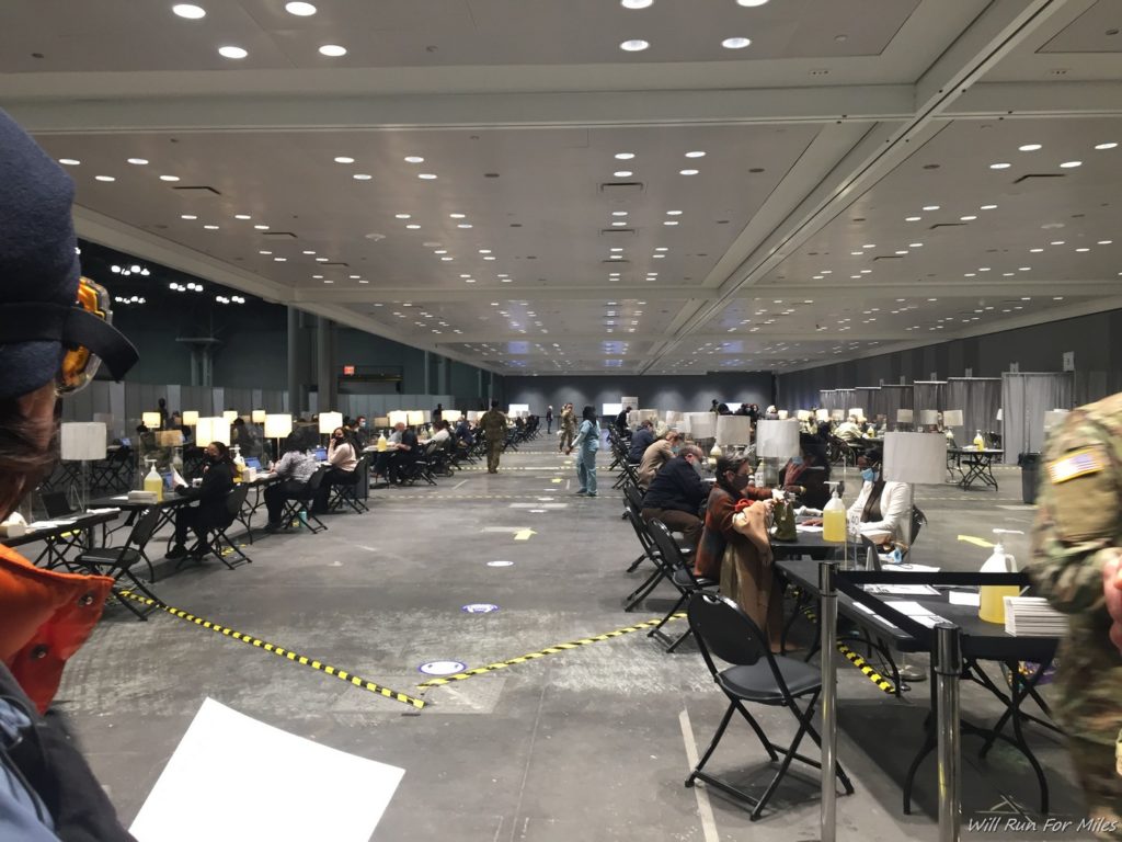 a large room with many tables and chairs