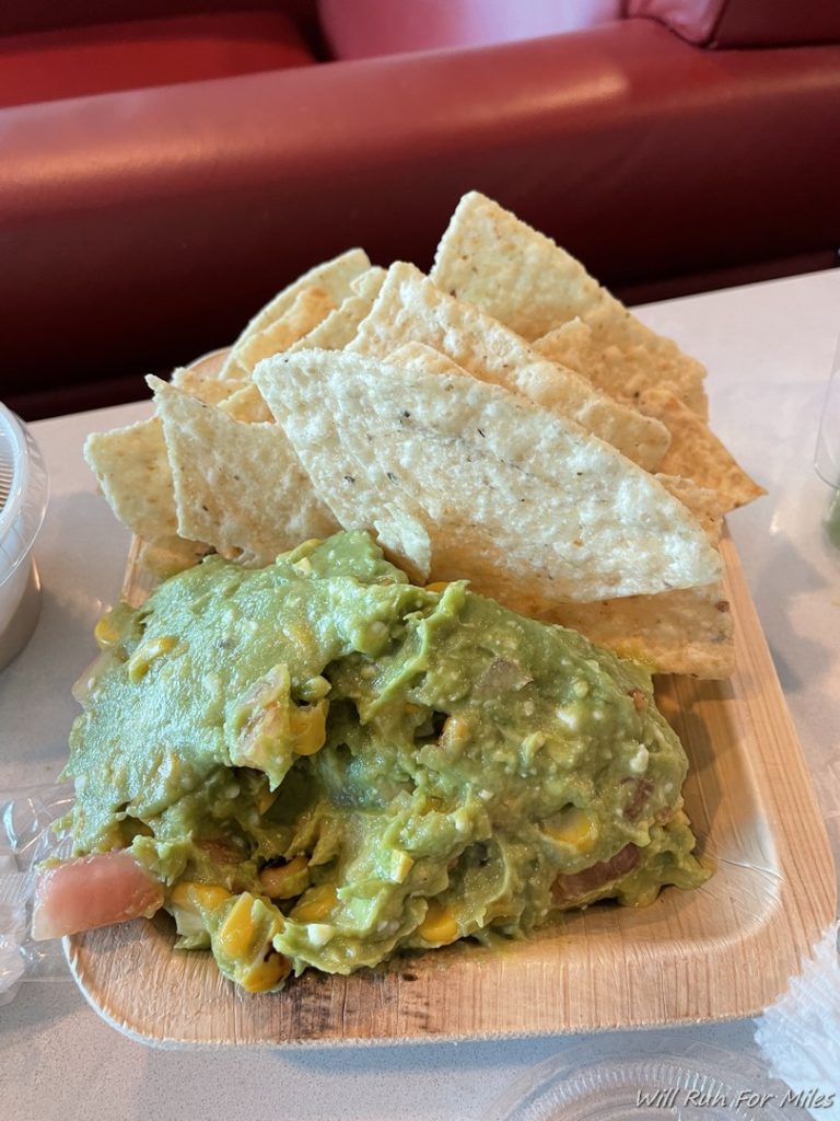 a plate of chips and guacamole