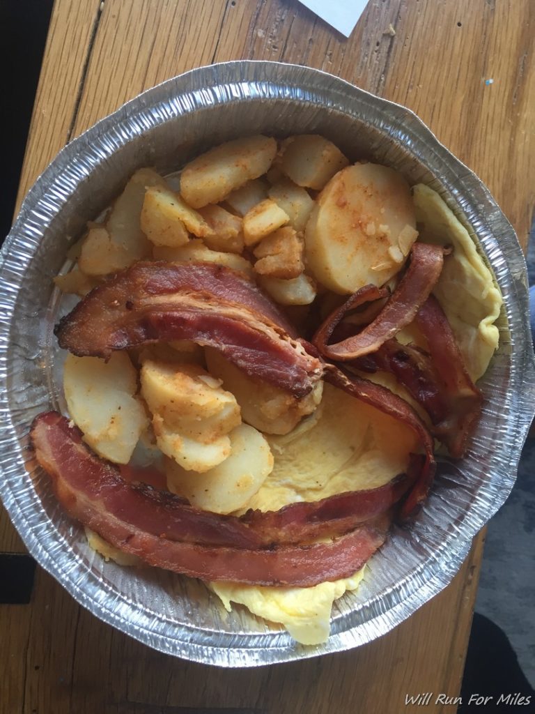 a bowl of bacon and potatoes