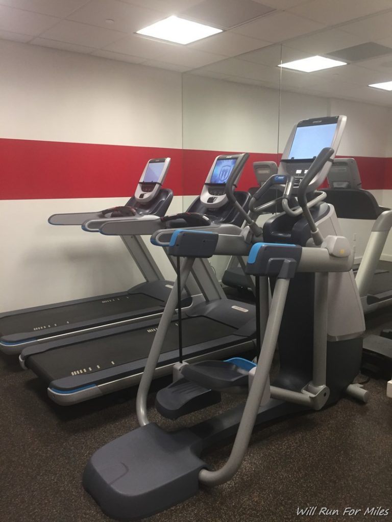 a group of treadmills in a room