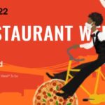 a man riding a bicycle with a pizza on it