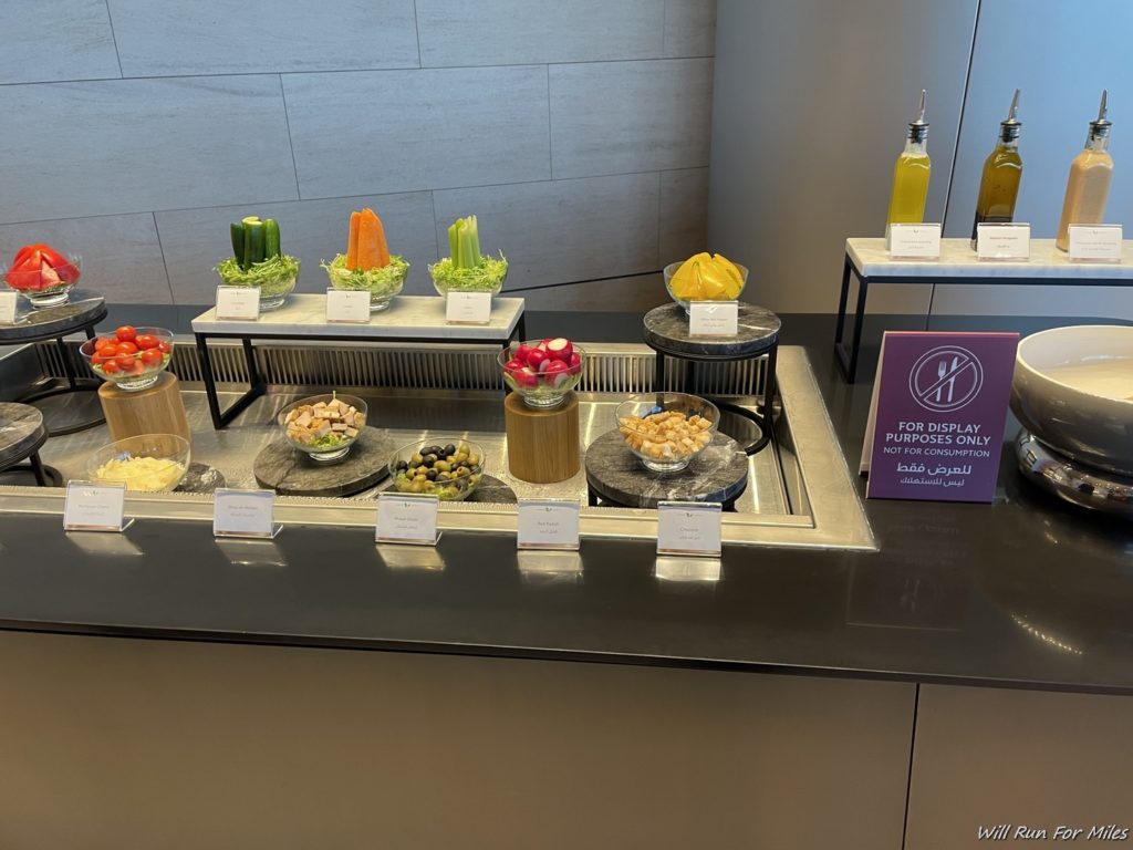 a buffet table with different foods on it