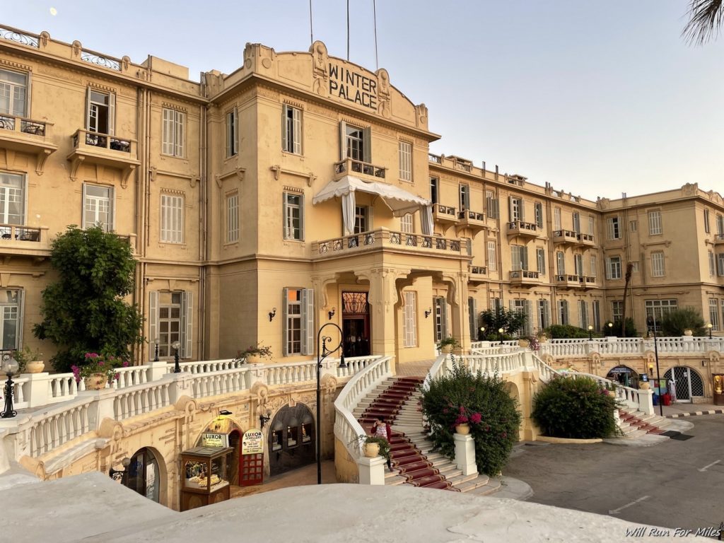 a building with stairs leading to the entrance