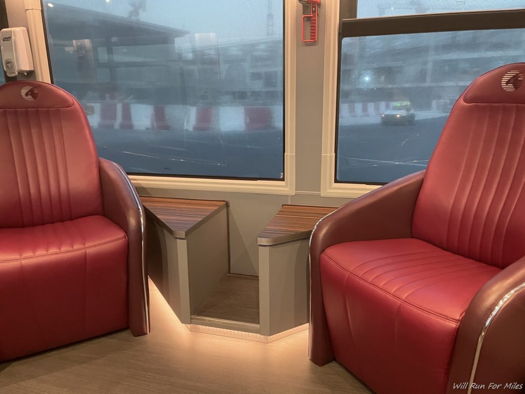 a red chairs in a bus