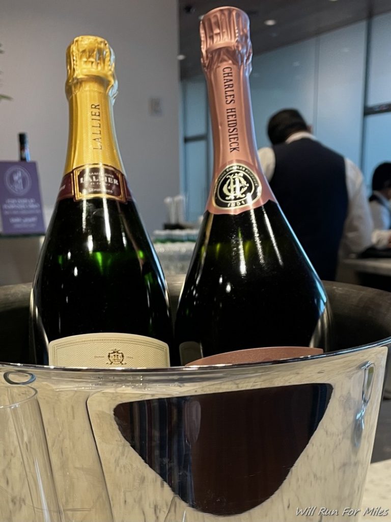 two bottles of champagne in a bucket
