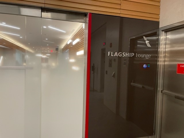 an elevator with a glass door