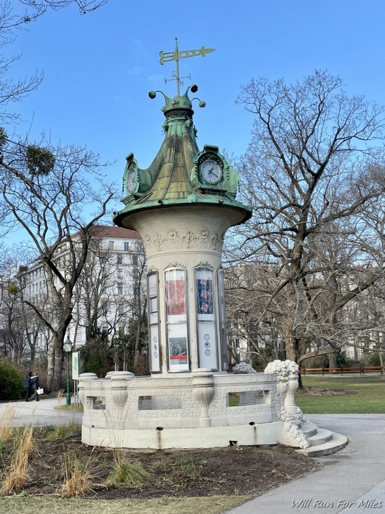 a clock tower in a park