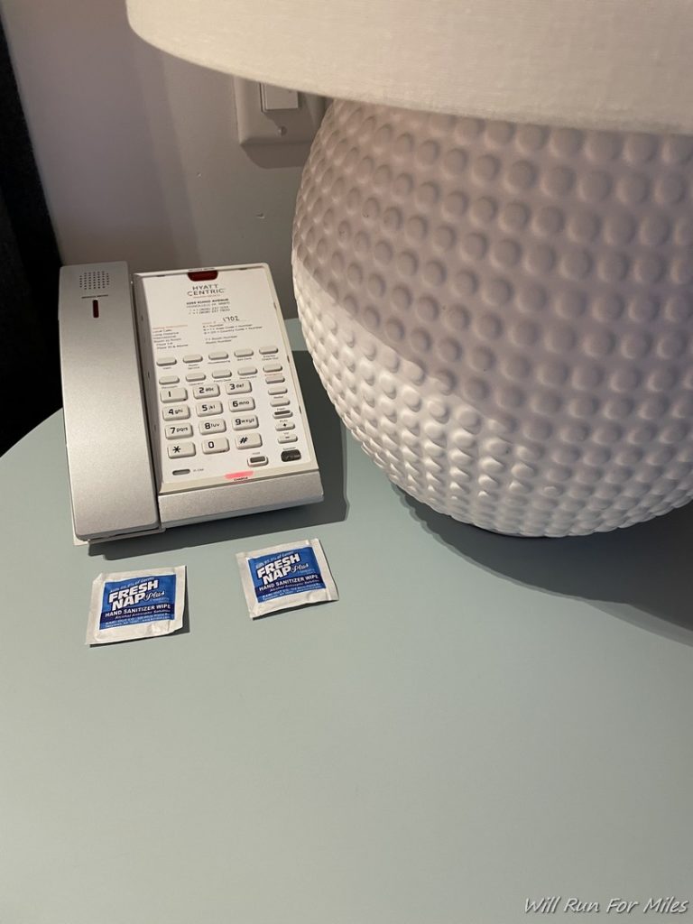 a telephone and a bowl of fresh sap packets