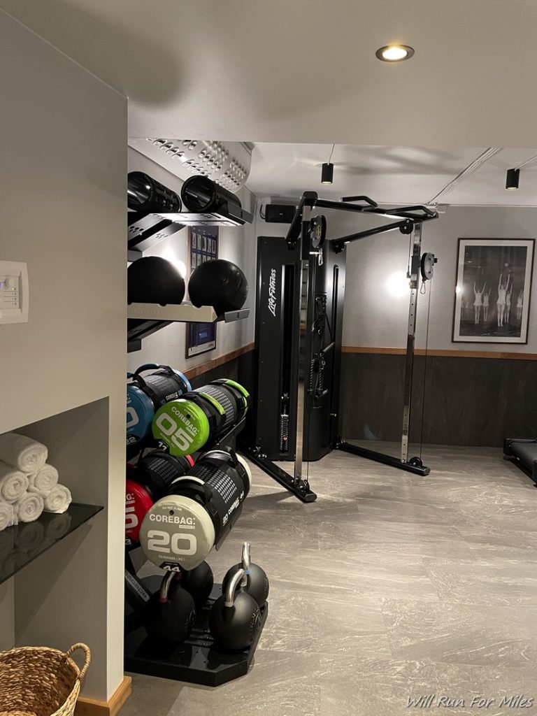 a room with weights and weights on shelves
