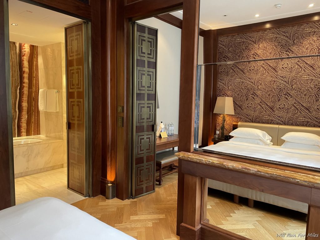 a room with a bed and a shower