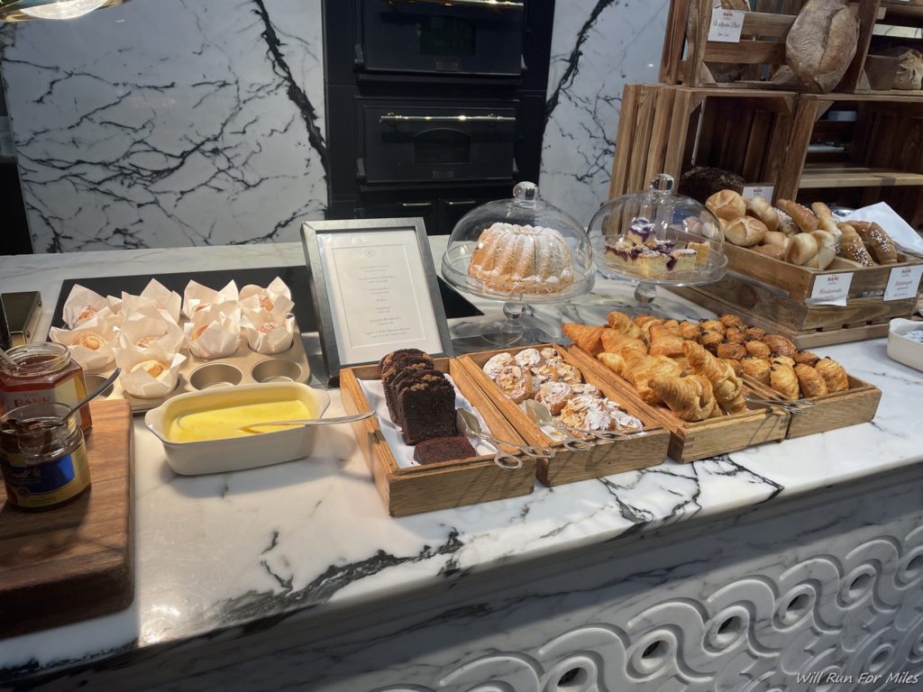 a counter with different types of pastries