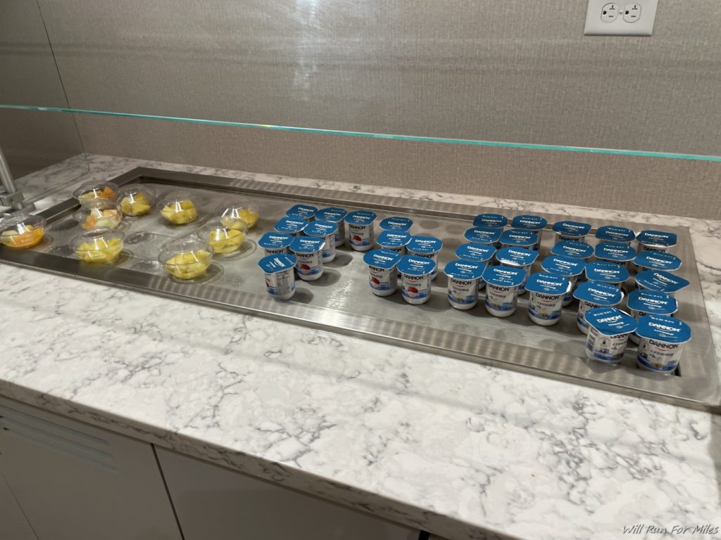 a tray of yogurt containers on a counter