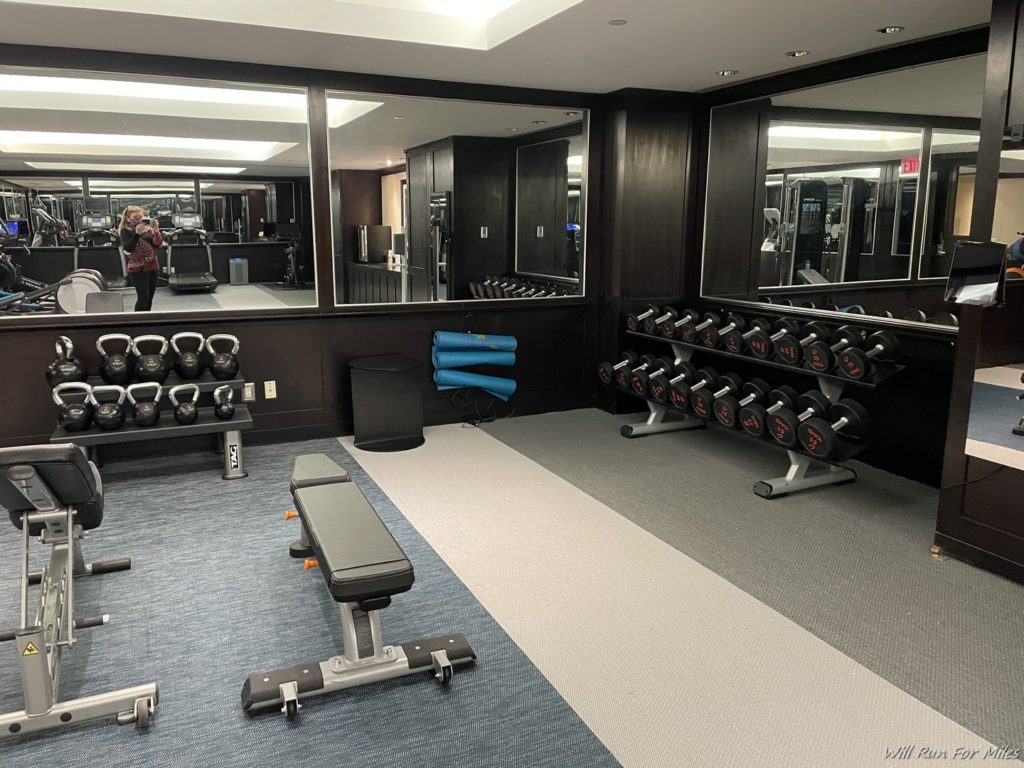 a room with weights and mirrors