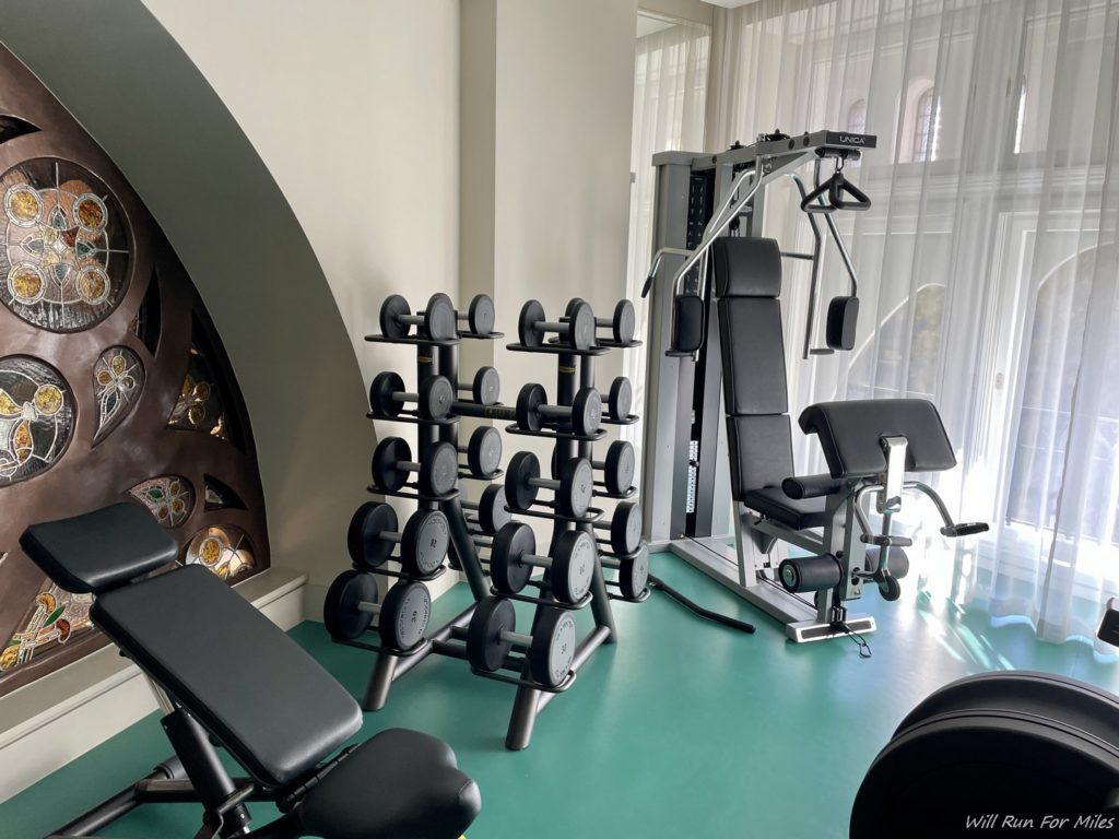 a gym with weights and exercise equipment