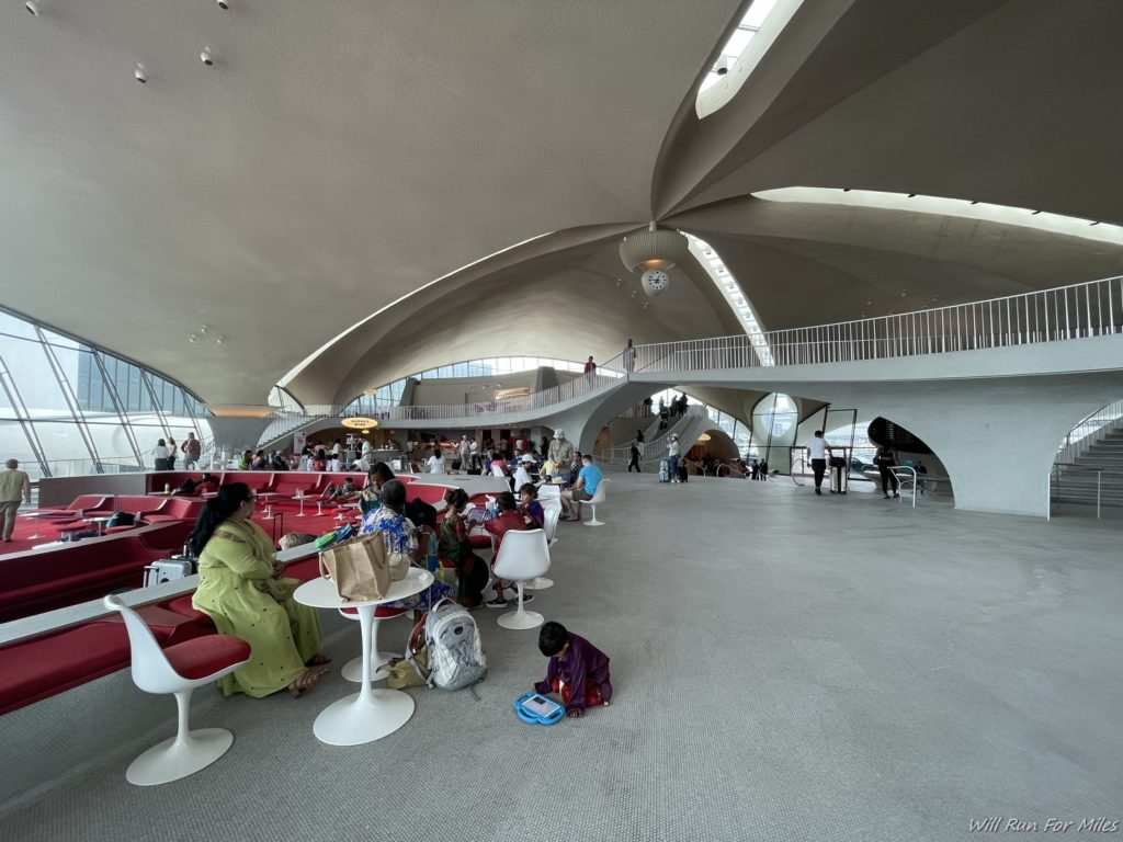 a group of people sitting in a large room