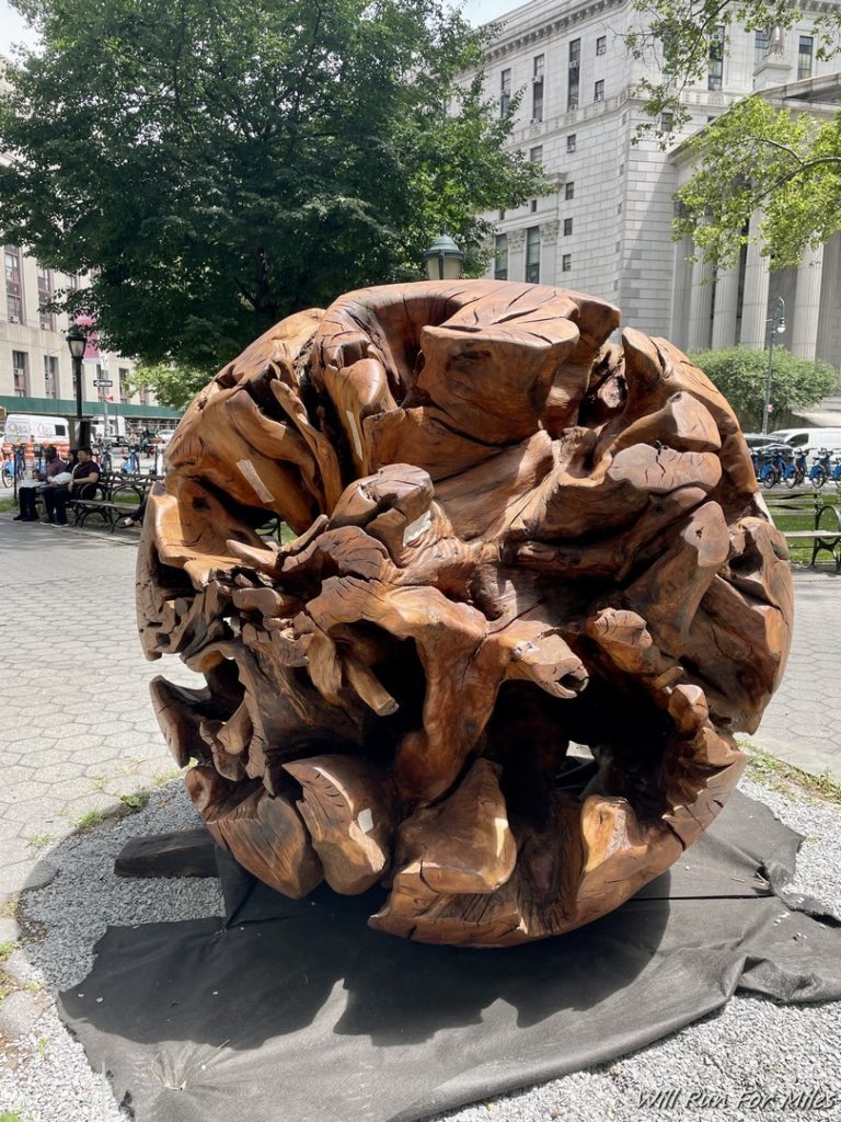 a large wooden sculpture in a park