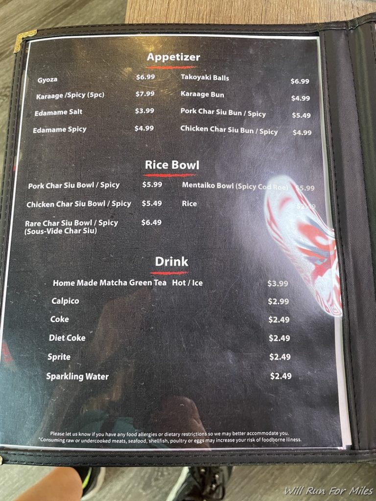 a menu with price list and white text
