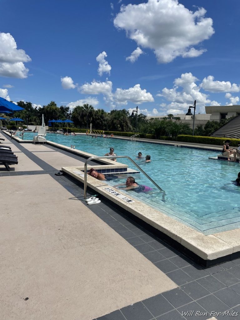 people swimming in a pool