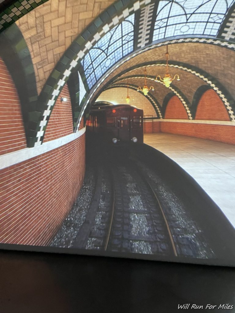 a picture of a train going through a tunnel