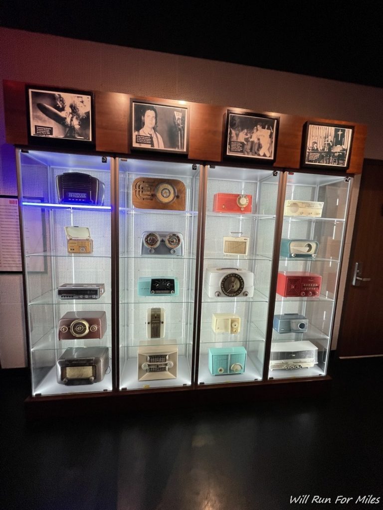 a display case with electronics on it