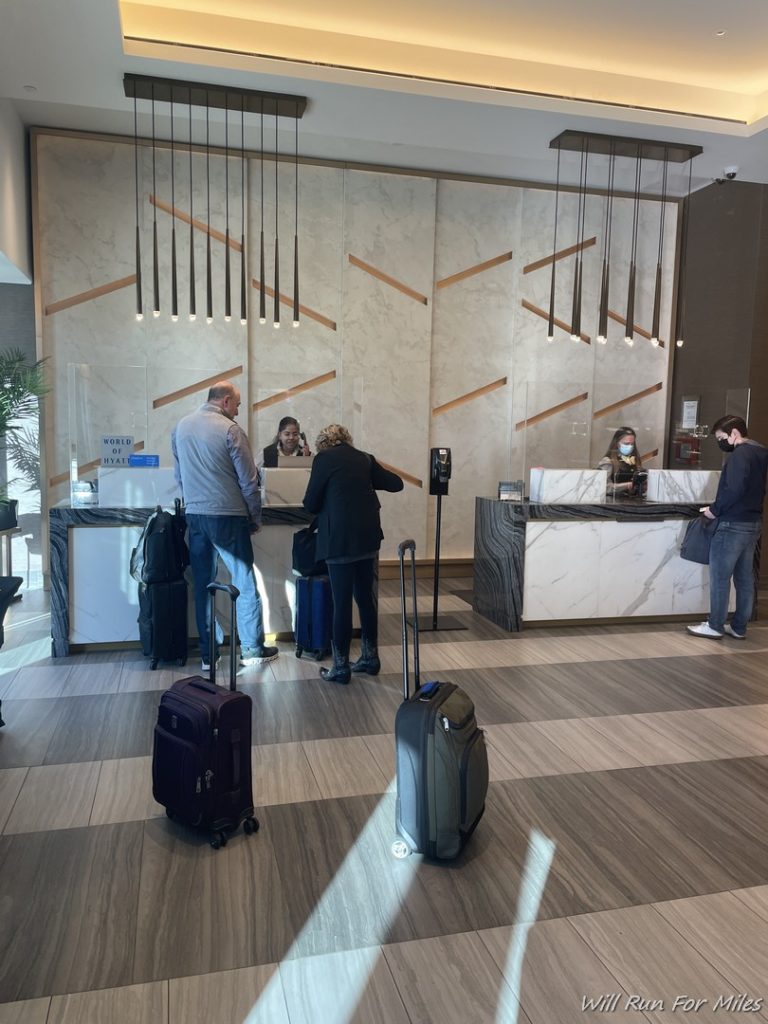 a group of people at a hotel reception