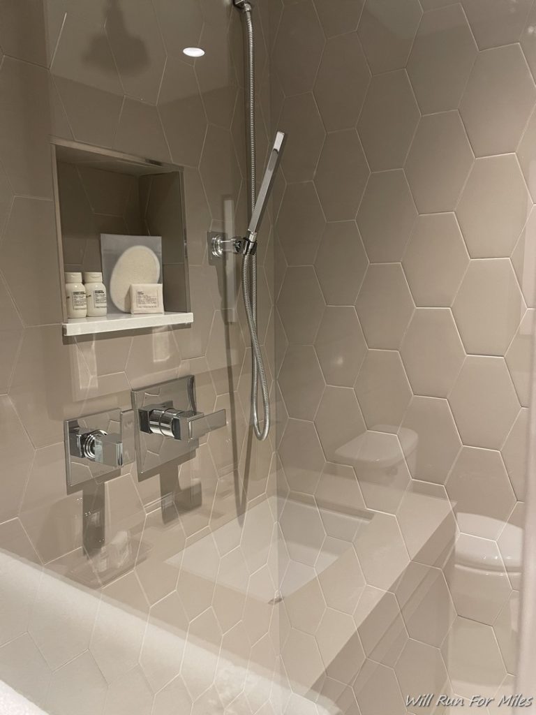 a shower with a bathtub and toilet