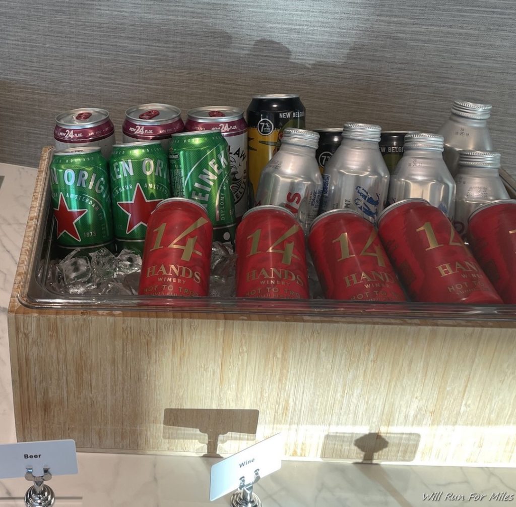 a group of cans in a wooden box