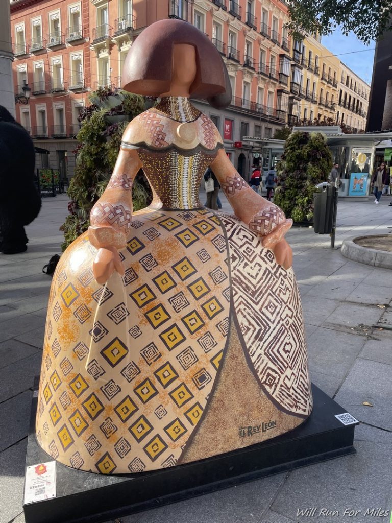 a statue of a woman in a dress