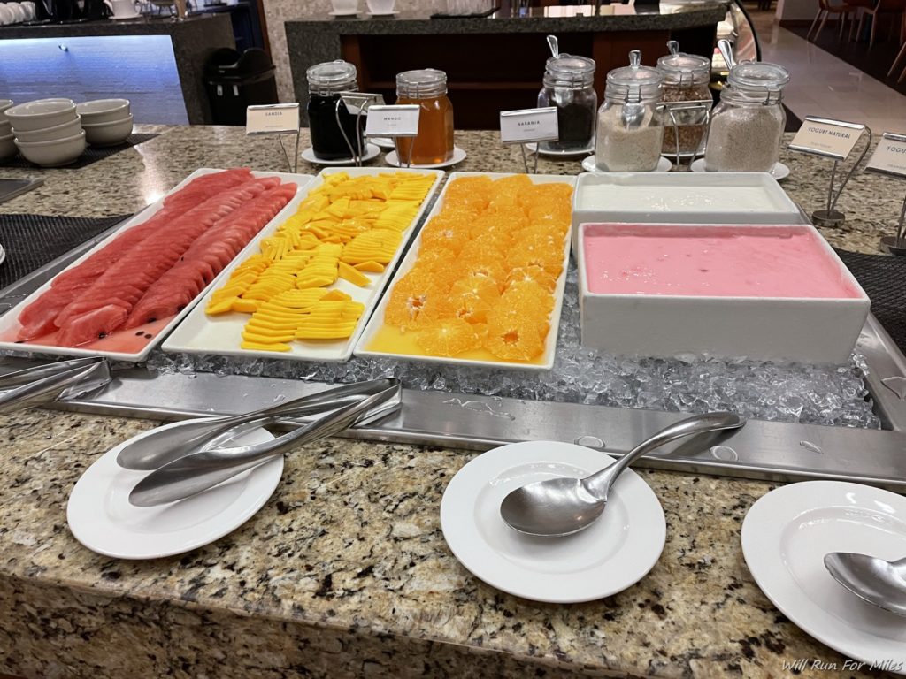 a buffet table with different types of food on it