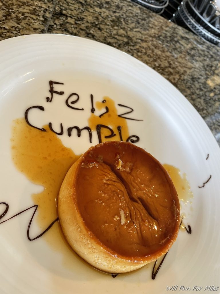 a plate with a flan on it
